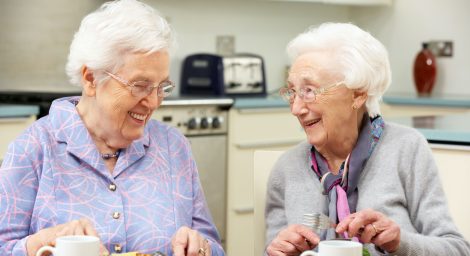 older women eating a meal together